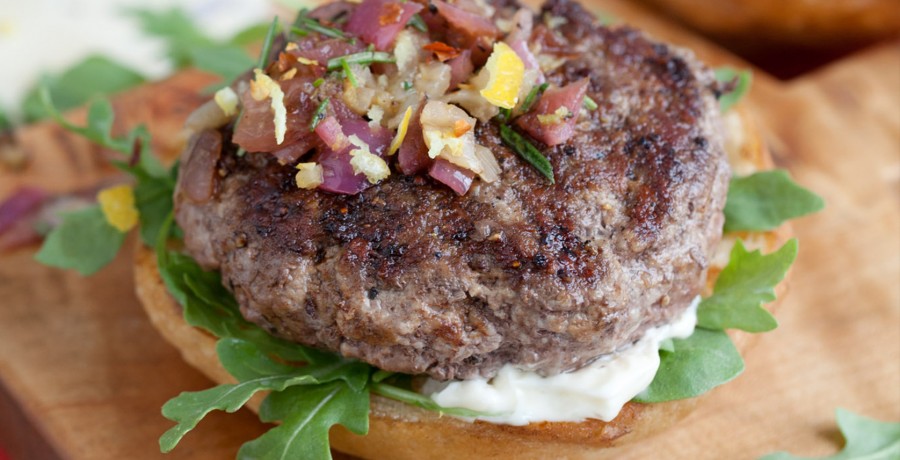 Juicy Grilled American Lamb Burger with Caramelized Onion, Fennel and Lemon Relish